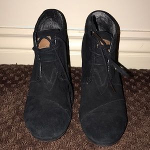 pair of black toms wedges